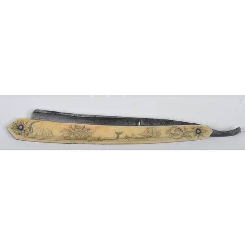 274 - A 19th Century Sailors Maritime marine ivory cut throat shaving razor. Scrimshaw decoration depictin... 