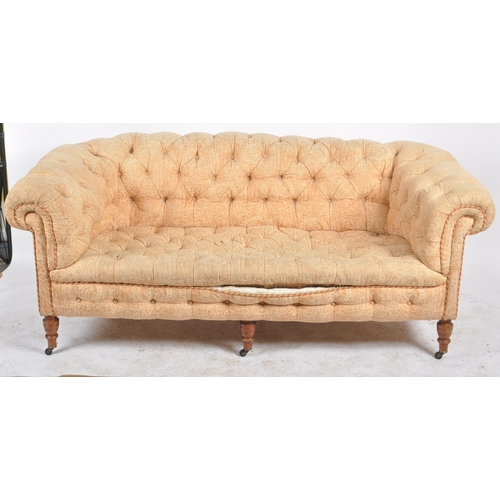 276 - A 19th Century Victorian two seater sofa settee having Chesterfield style scrolled button backed bac... 