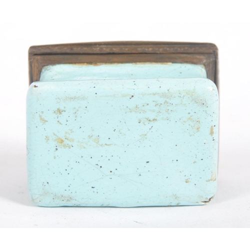 280 - A 19th Century square enamelled pill box, the copper lid inset an enamelled with the text 