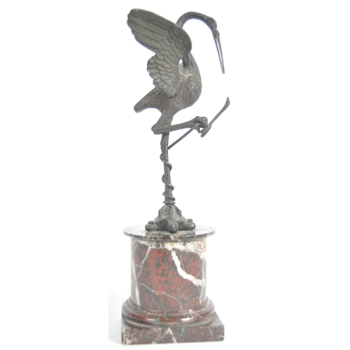 281 - A 19th Century bronze animal group depicting a pelican standing on the back of a tortoise with snake... 