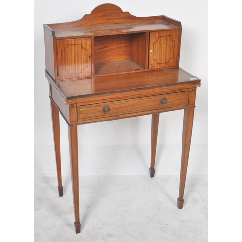 291 - A 19th Century Satinwood Bonheur De Jour Victorian Ladies writing table desk. Comprises an arched ga... 