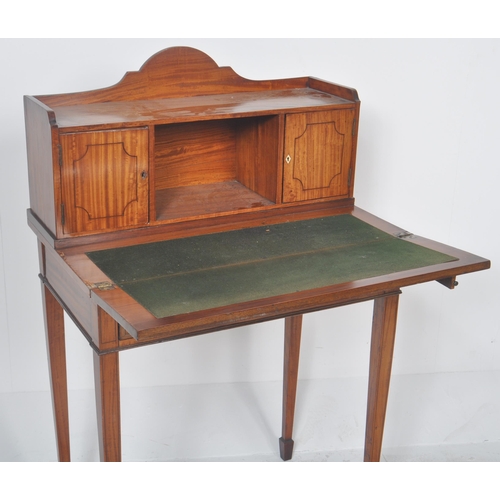 291 - A 19th Century Satinwood Bonheur De Jour Victorian Ladies writing table desk. Comprises an arched ga... 