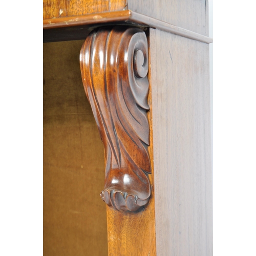 295 - A 19th Century Victorian mahogany open bookcase having a carved scrolled folate top with shelf below... 