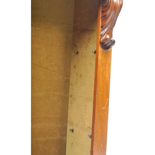 295 - A 19th Century Victorian mahogany open bookcase having a carved scrolled folate top with shelf below... 