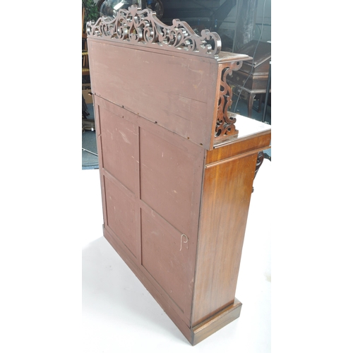 295 - A 19th Century Victorian mahogany open bookcase having a carved scrolled folate top with shelf below... 