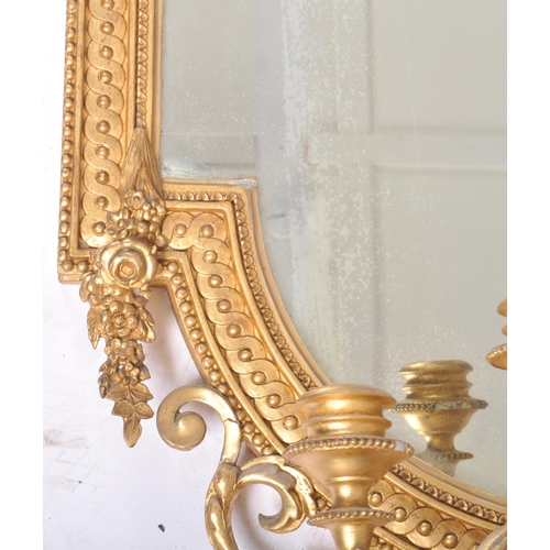 300 - A pair of 19th Century large gilt wood and gesso worked girandole wall mirrors. Each mirror adorned ... 