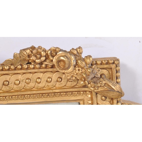 300 - A pair of 19th Century large gilt wood and gesso worked girandole wall mirrors. Each mirror adorned ... 