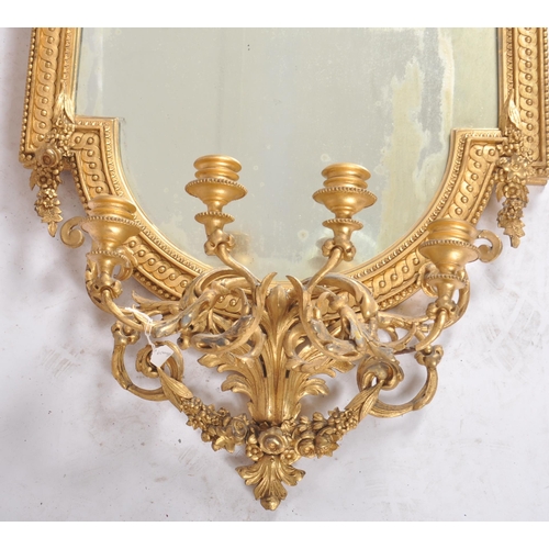 300 - A pair of 19th Century large gilt wood and gesso worked girandole wall mirrors. Each mirror adorned ... 