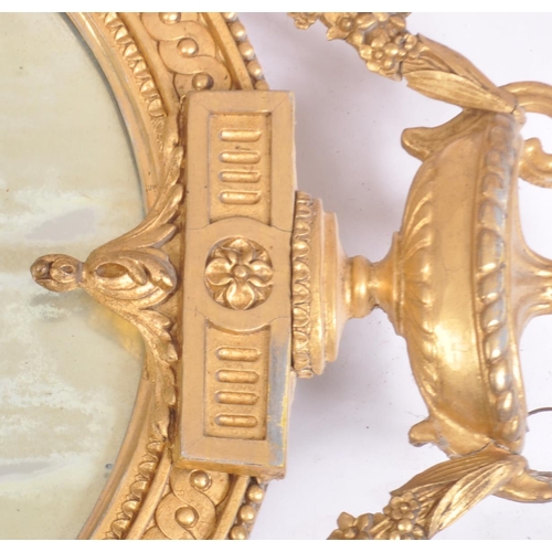 300 - A pair of 19th Century large gilt wood and gesso worked girandole wall mirrors. Each mirror adorned ... 