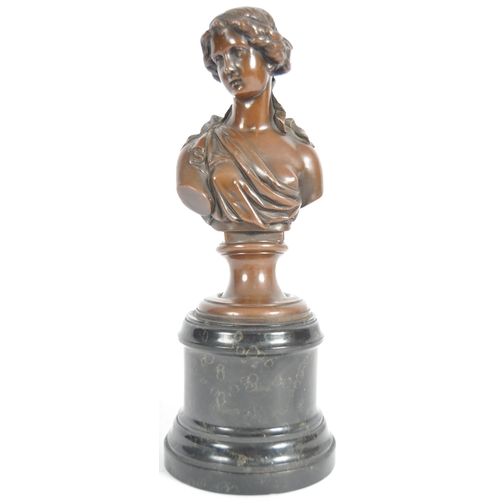 301 - A 19th Century bronze figurine in the form of a bust of a young woman / maiden. Hair modelled up set... 