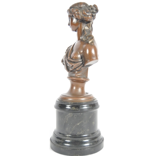 301 - A 19th Century bronze figurine in the form of a bust of a young woman / maiden. Hair modelled up set... 