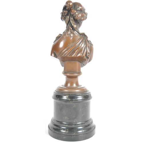 301 - A 19th Century bronze figurine in the form of a bust of a young woman / maiden. Hair modelled up set... 