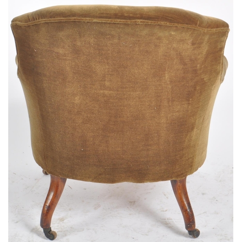 310 - A 19th Century Victorian armchair having a shaped backrest and overstuffed padded seat rest. All rai... 