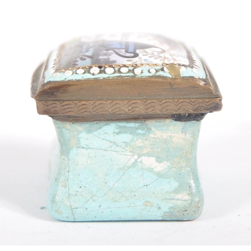 324 - A 19th century square enamelled pill box, the copper lid inset an enamelled with the text 