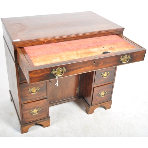 329 - An 18th Century Georgian George III mahogany knee hole writing table desk. Writing area to top with ... 