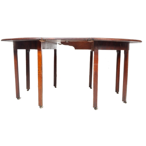 331 - A 19th Century George III mahogany D end extending dining table comprises two demi lune form side ta... 