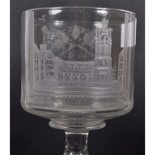 338 - A 19th Century Victorian etched glass drinking goblet. Engraved decoration depicting St Nicholas Chu... 