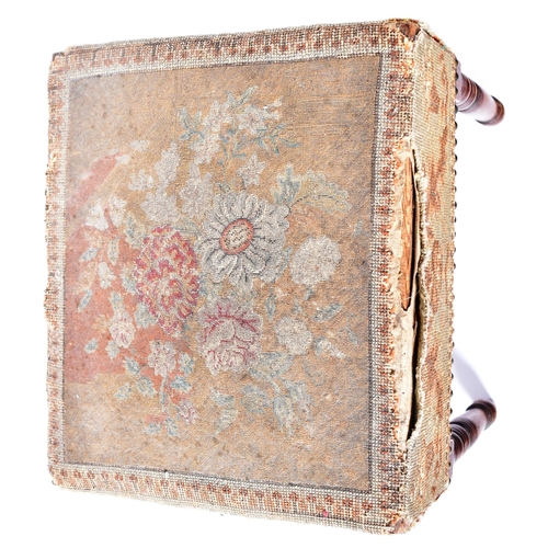 339 - An early 19th Century George III stool having an urn and flower tapestry cushioned top with stud det... 