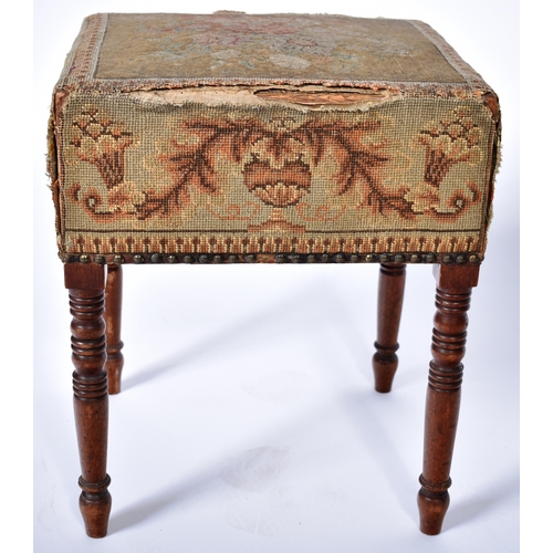 339 - An early 19th Century George III stool having an urn and flower tapestry cushioned top with stud det... 