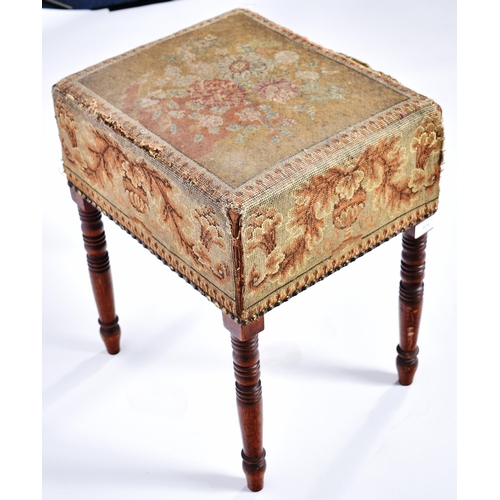 339 - An early 19th Century George III stool having an urn and flower tapestry cushioned top with stud det... 