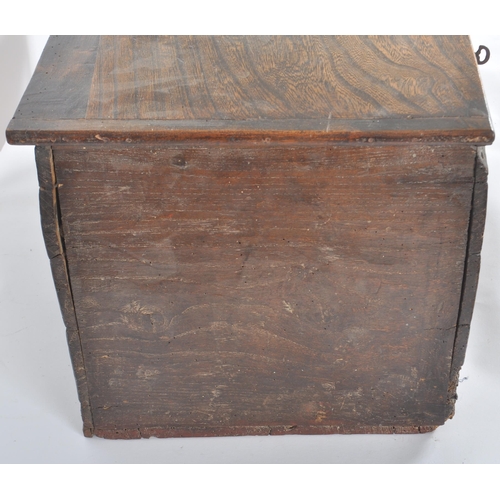 342 - A 17th century and later oak carved bible box. Of large proportions, the hinged lid opening to revea... 