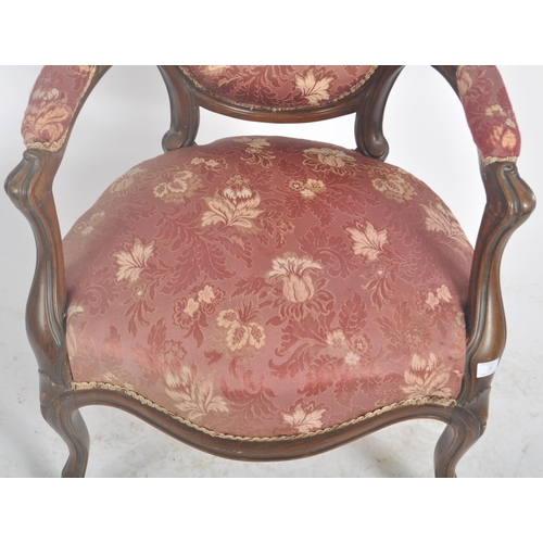 35 - A 19th Century Victorian rosewood salon armchair / chair. Shaped back with carved decoration. Pink f... 