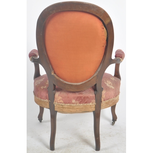 35 - A 19th Century Victorian rosewood salon armchair / chair. Shaped back with carved decoration. Pink f... 