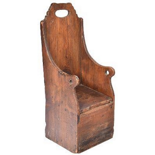 359 - An 18th Century oak and stained pine children's chair having a tall carved backrest with central han... 