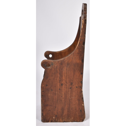 359 - An 18th Century oak and stained pine children's chair having a tall carved backrest with central han... 