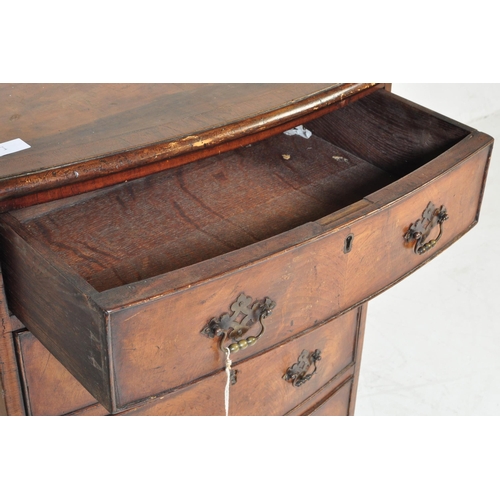 363 - An 18th Century George III mahogany and walnut crossbanded bachelors chest of drawers. The bank of f... 