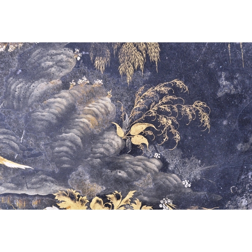 371 - An early 19th Century Regency painted Chinoiserie Japanned toleware tray of oval form having a serpe... 