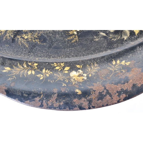 371 - An early 19th Century Regency painted Chinoiserie Japanned toleware tray of oval form having a serpe... 