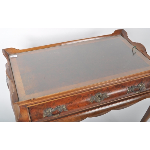 373 - A 19th Century walnut silver table having a raised gallery edge tray top with single drawer to the f... 