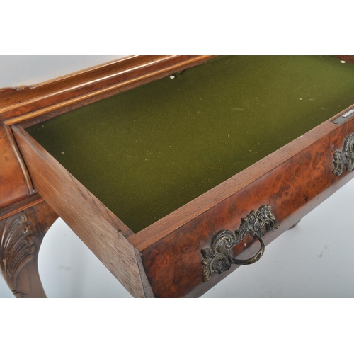 373 - A 19th Century walnut silver table having a raised gallery edge tray top with single drawer to the f... 