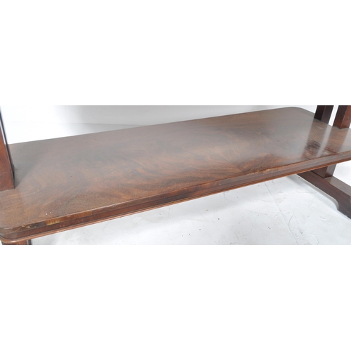 375 - A 19th Century William IV mahogany sofa table / writing table desk having a chamfered edge with carv... 