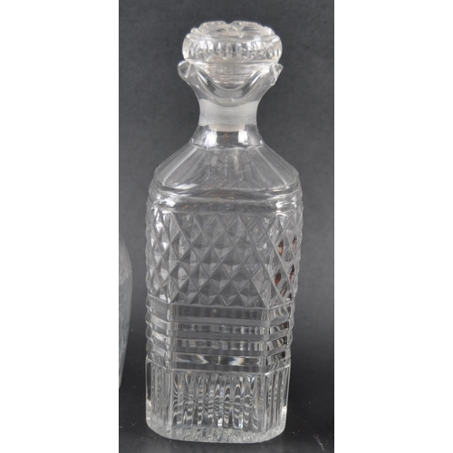 386 - A collection of 19th century glass decanters. Six hand blown and hand cut to include engraved glass ... 