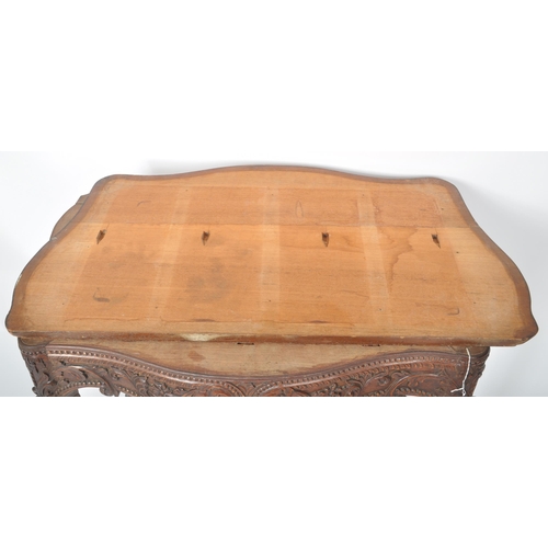 387 - An 18th Century Robert Adam carved oak hall table having a serpentine chamfered edge top over a deco... 