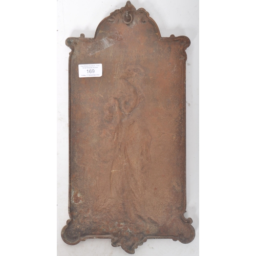 391 - An early 20th Century Art Nouveau cast iron wall plaque cast in relief depicting a classical maiden ... 