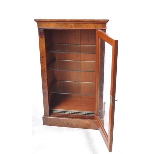 394 - 19th century Victorian walnut  pier  display cabinet. Raised on a plinth base with single glazed pan... 