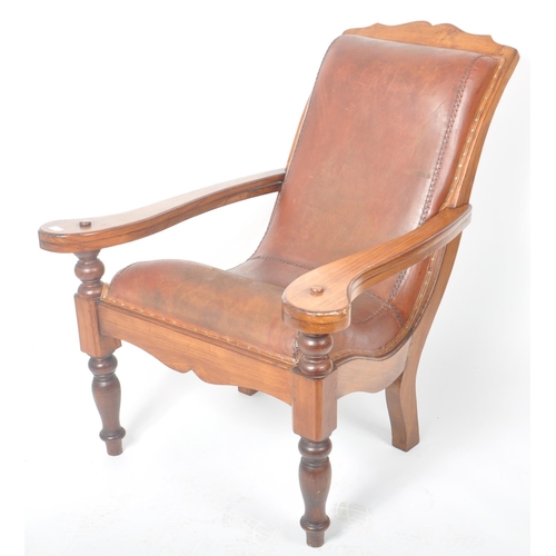 395 - A 19th Century Victorian Colonial mahogany and leather plantation chair, with swing out leg rests ra... 