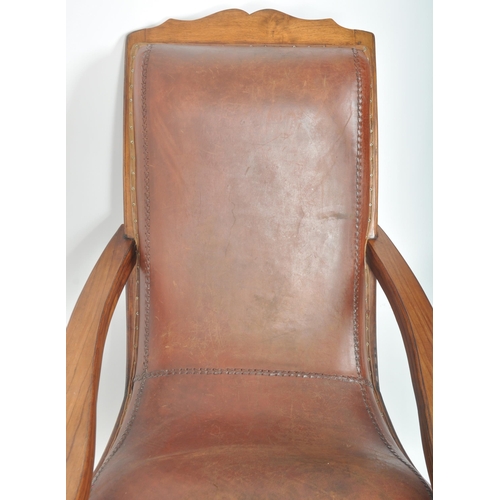 395 - A 19th Century Victorian Colonial mahogany and leather plantation chair, with swing out leg rests ra... 