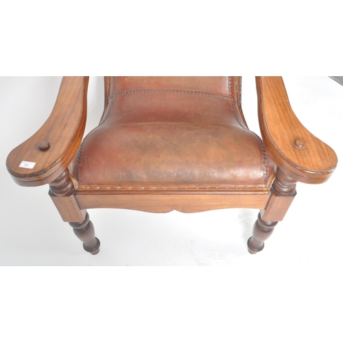 395 - A 19th Century Victorian Colonial mahogany and leather plantation chair, with swing out leg rests ra... 