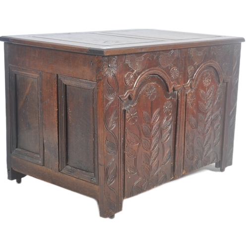 40 - A large 18th Century carved oak coffer blanket box storage chest trunk. Intricate carved floral pane... 