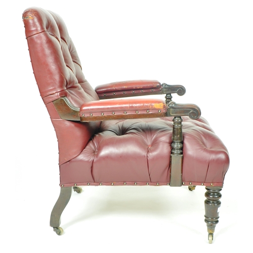 405 - A 19th Century Victorian leather chesterfield library reading fireside club armchair arm chair. Butt... 