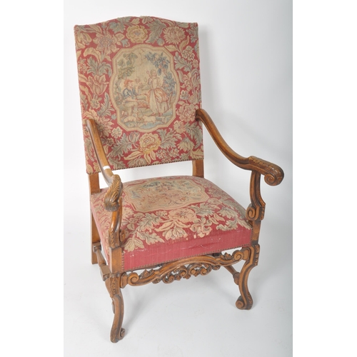 409 - A large 19th Century George III walnut and tapestry upholstered throne gainsborough armchair / fires... 