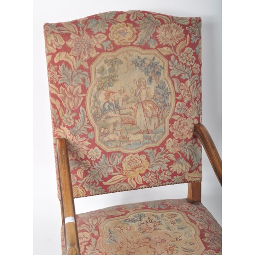 409 - A large 19th Century George III walnut and tapestry upholstered throne gainsborough armchair / fires... 