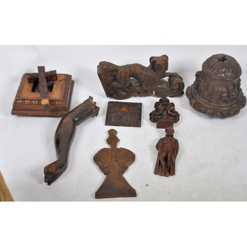 420 - A collection of 18th, 19th and 20th century ecclesiastical carved objects and figures. To include; a... 