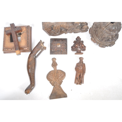 420 - A collection of 18th, 19th and 20th century ecclesiastical carved objects and figures. To include; a... 