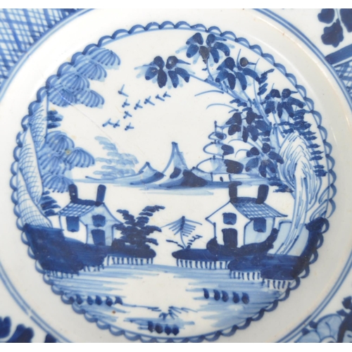 427 - A pair of 18th Century Dutch Delft tin glazed earthenware blue and plates. Hand painted blue and whi... 