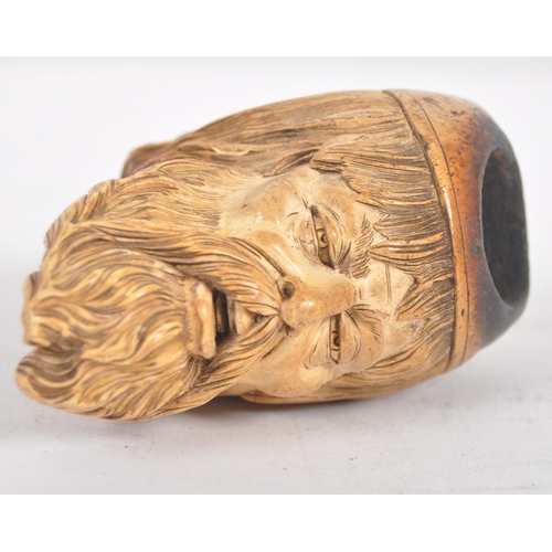 428 - An early 20th century meerschaum tobacco pipe carved in the form of a bearded gentlemen wearing a ni... 